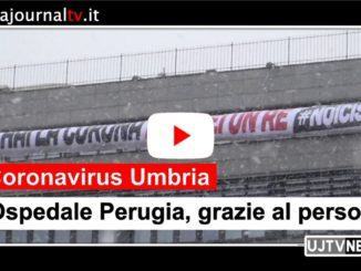 Grande striscione, "Covid 19 hai la corona ma non sei un re"